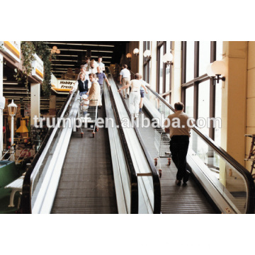 Moving sidewalk escalator in mall